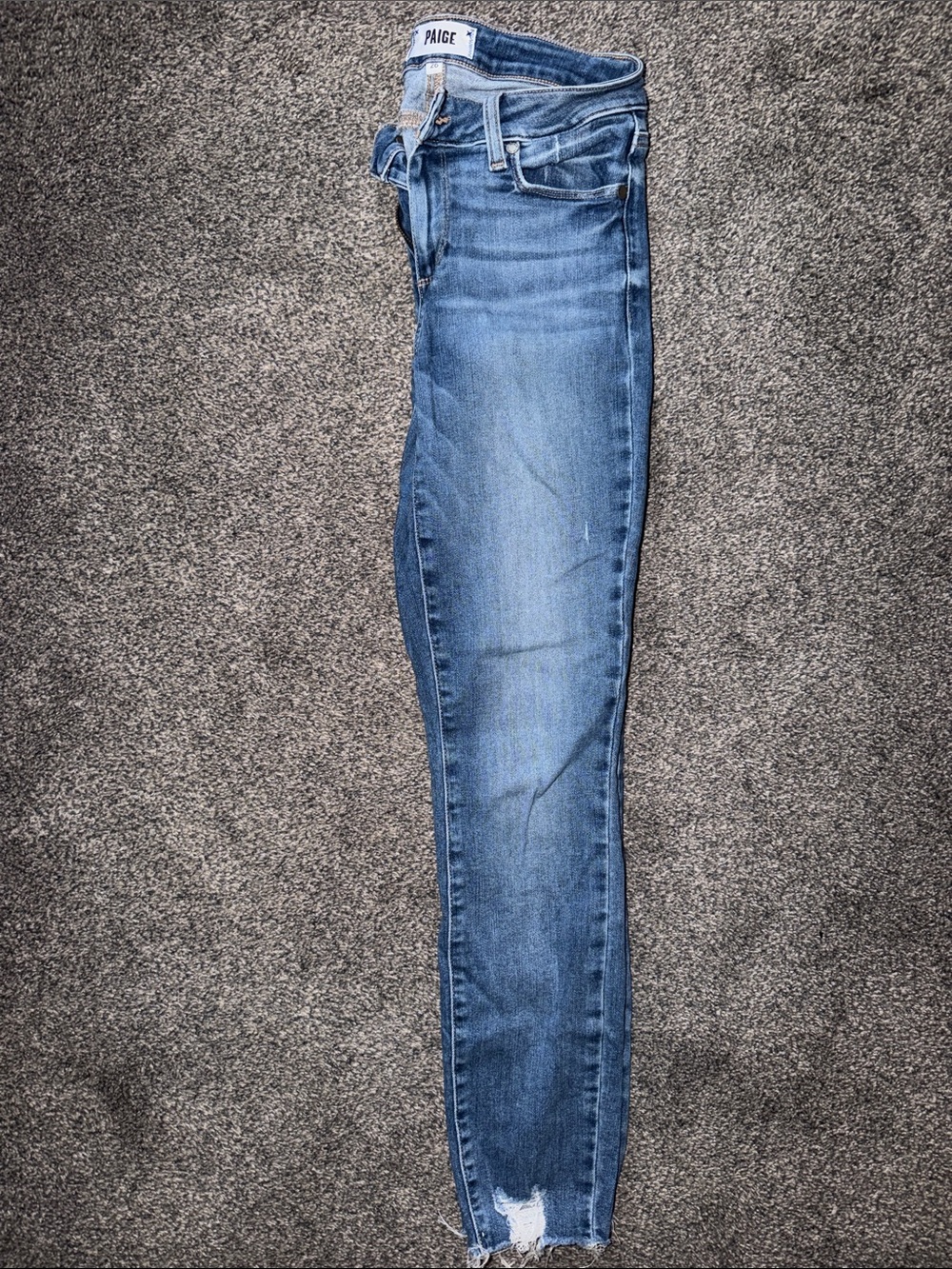 PAIGE Light Blue Skinny Jeans with Distressed Hem